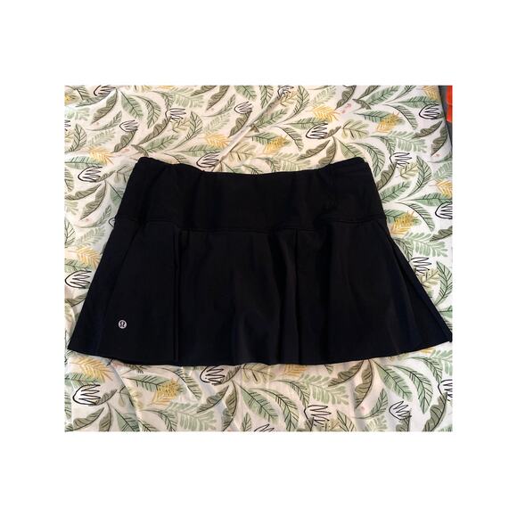 lululemon athletica Dresses & Skirts - Lululemon Hit Your Stride Skirt Black Size 10 Tennis Ruffle Water Repellent